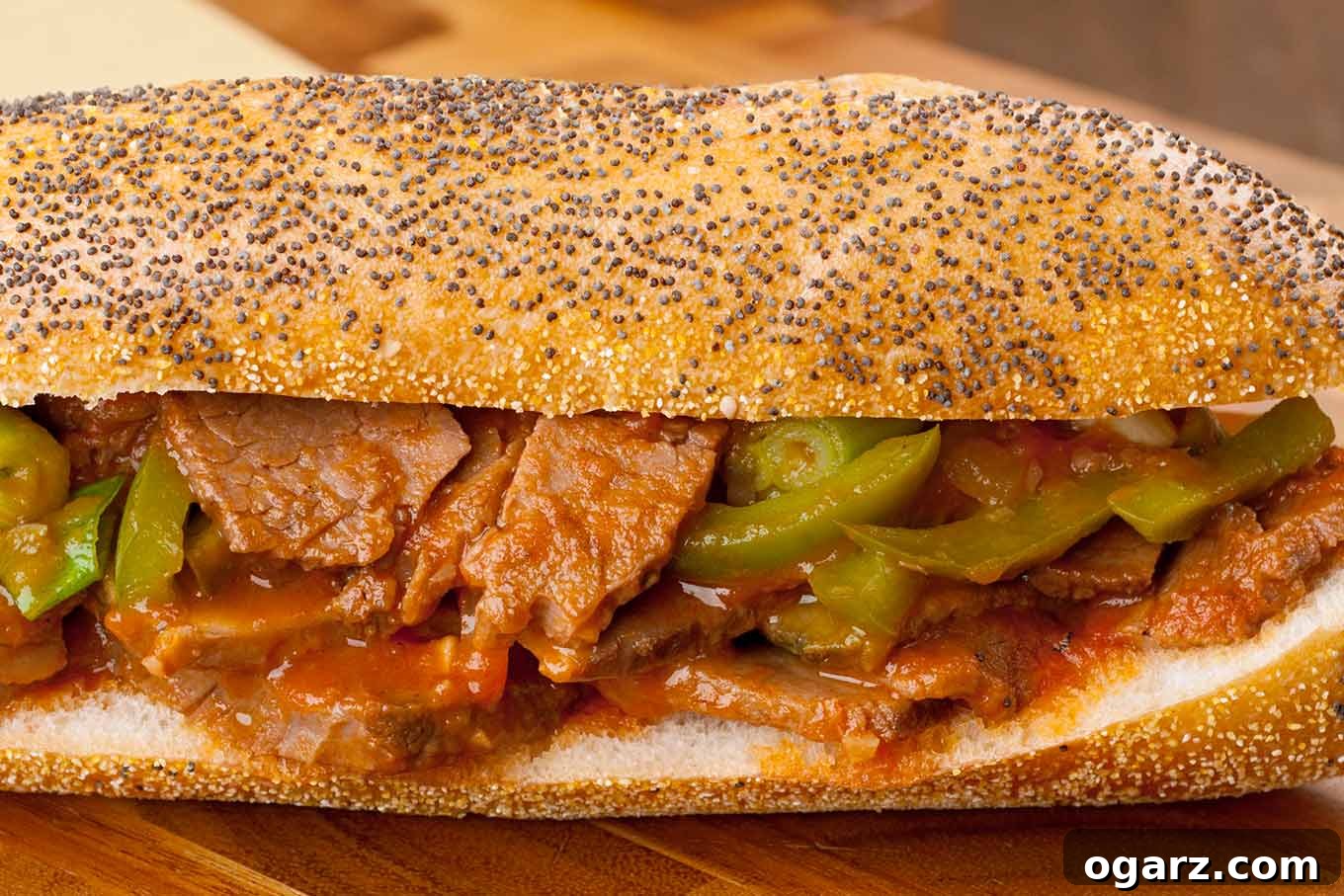 Marmalade-Braised Beef Brisket 4 A poppy seed hoagie roll filled with thin slices of beef brisket, sautéed peppers, and onions tossed in barbecue sauce.