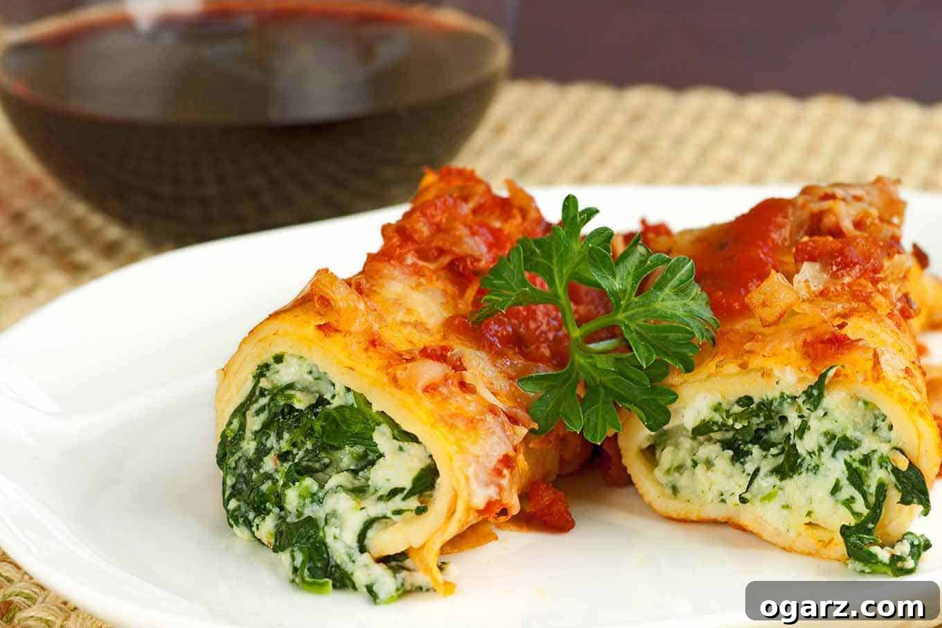 Creamy Spinach and Cheese Manicotti 2 Delicious Spinach and Cheese Stuffed Crepes with Homemade Marinara Sauce