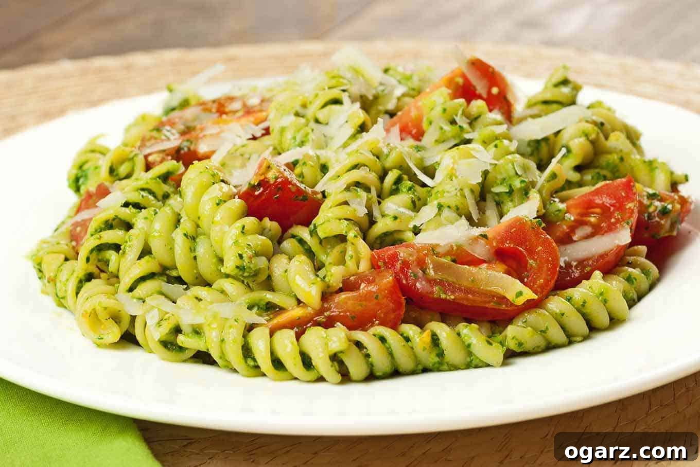 Verdant Pesto Rotini with Sun-Kissed Tomatoes 2 Rotini with Spinach-Basil Pesto and Tomatoes