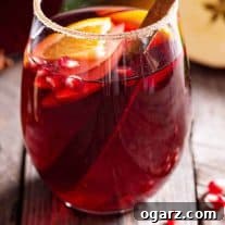 A smaller image of the Winter Spice Sangria, showing its rich color and festive fruit.