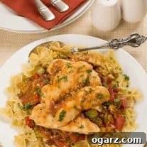 A close-up of Mediterranean Sweet and Sour Chicken with pasta