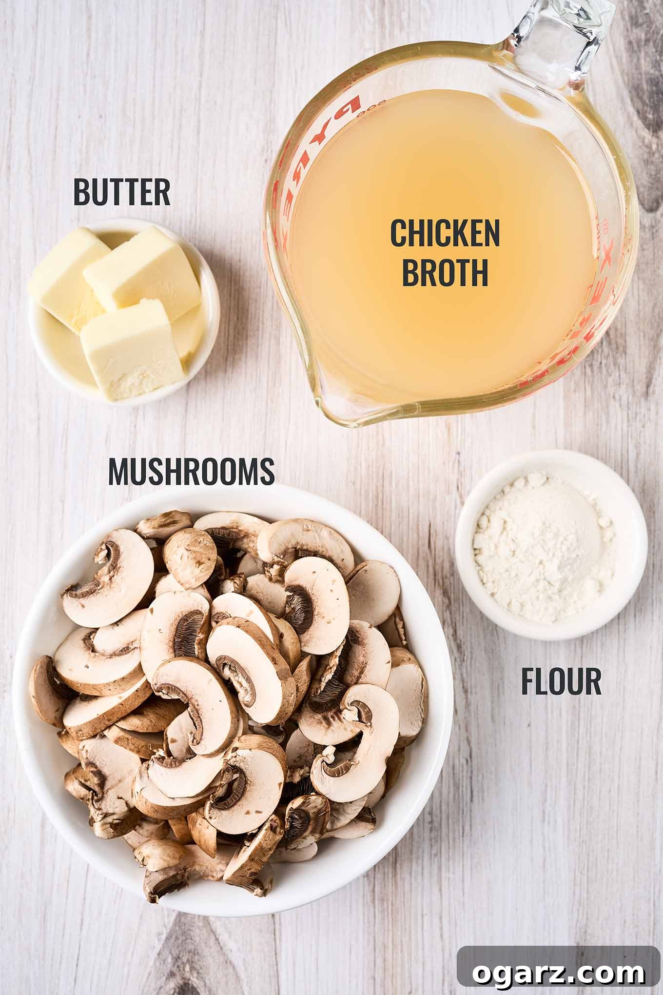 Succulent Baked Turkey Tenderloins with Savory Stuffing 4 A labeled, overhead view of the ingredients needed for mushroom gravy including chicken broth, mushrooms, flour, and butter.