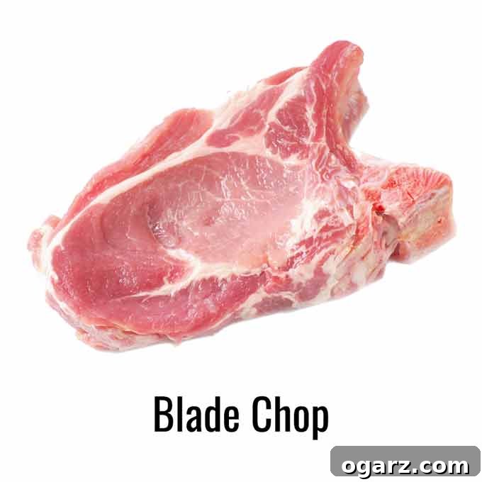 A pork blade chop on a white background. 