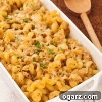 Thyme-Infused Cabbage Pasta with Parmesan 3 Baked cavatappi pasta with cabbage and thyme, topped with melted Parmesan cheese and parsley.