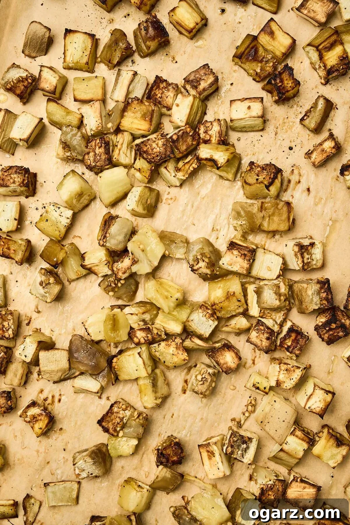 Pasta alla Norma A Sicilian Roasted Eggplant Classic 4 Cubed eggplant roasted on a parchment-lined baking sheet, lightly caramelized and seasoned with salt and pepper.