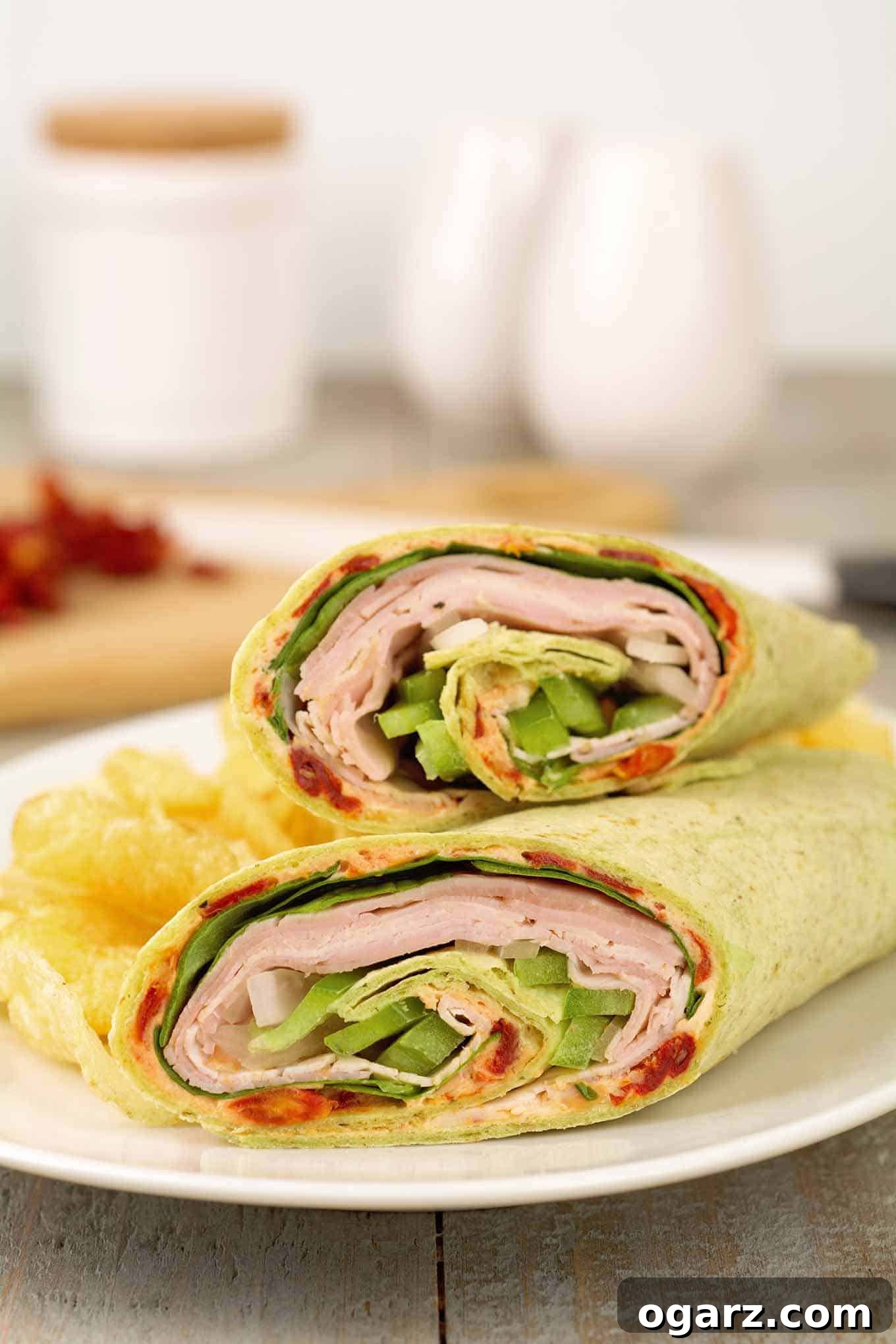 Sun-Drenched Turkey Pinwheels with Tangy Tomato 2 A sandwich wrap filled with sliced turkey, ham, green pepper, provolone cheese, and a sun-dried tomato spread.