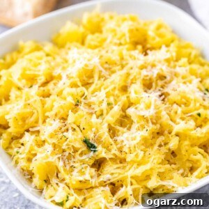 Strands of baked spaghetti squash on a plate