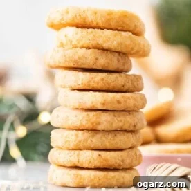 A perfectly arranged stack of golden-brown Heidesand cookies, showcasing their delicate texture.