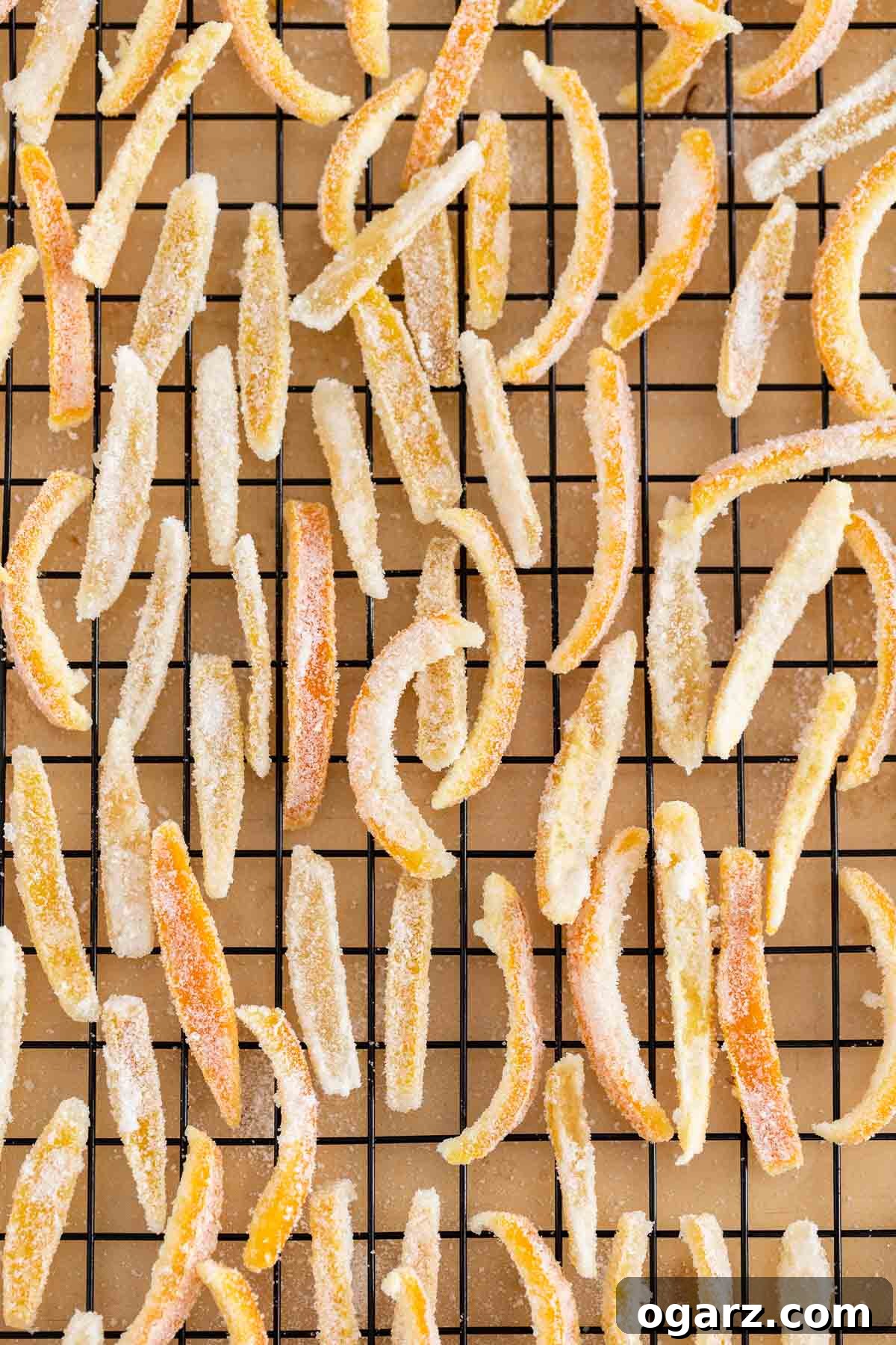 Golden Orange Gems 6 Many stripes of candied peel on a cooling rack.