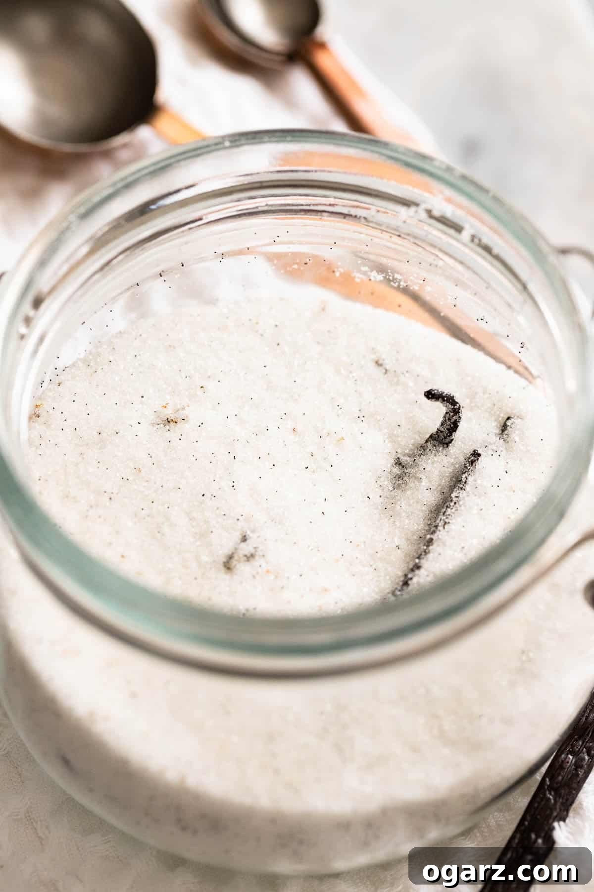 A large jar filled with vanilla sugar.