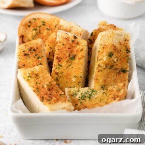 Air-Fried Garlic Bread Perfection 7 A white bowl filled with garlic bread.
