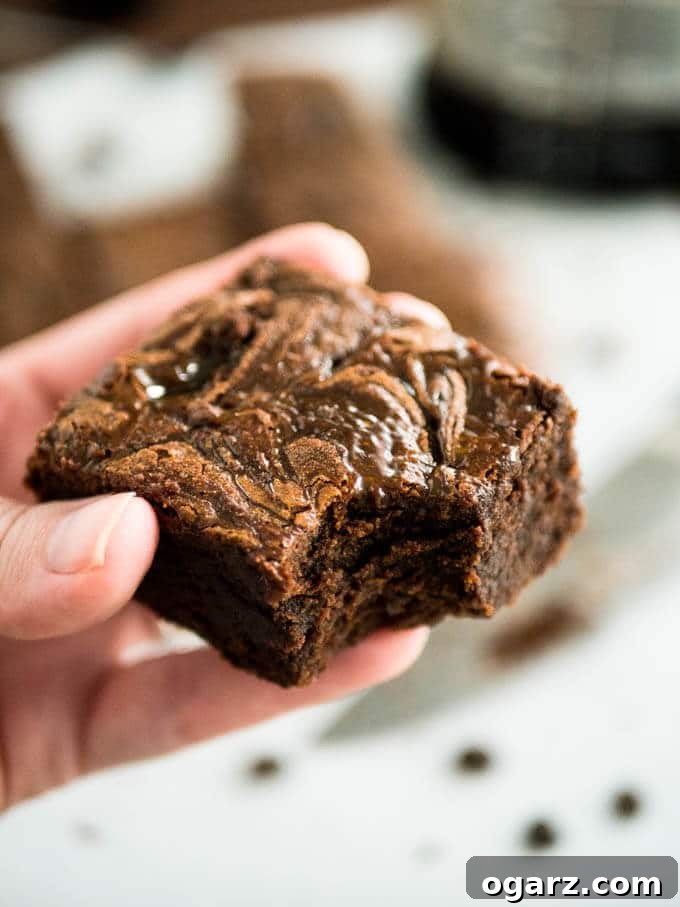 Cold Brew Coffee Brownies are rich, super fudgy, and made with cold brew coffee which takes the chocolate flavor to a new level! These delicious brownies satisfy all your caffeine and chocolate cravings.
