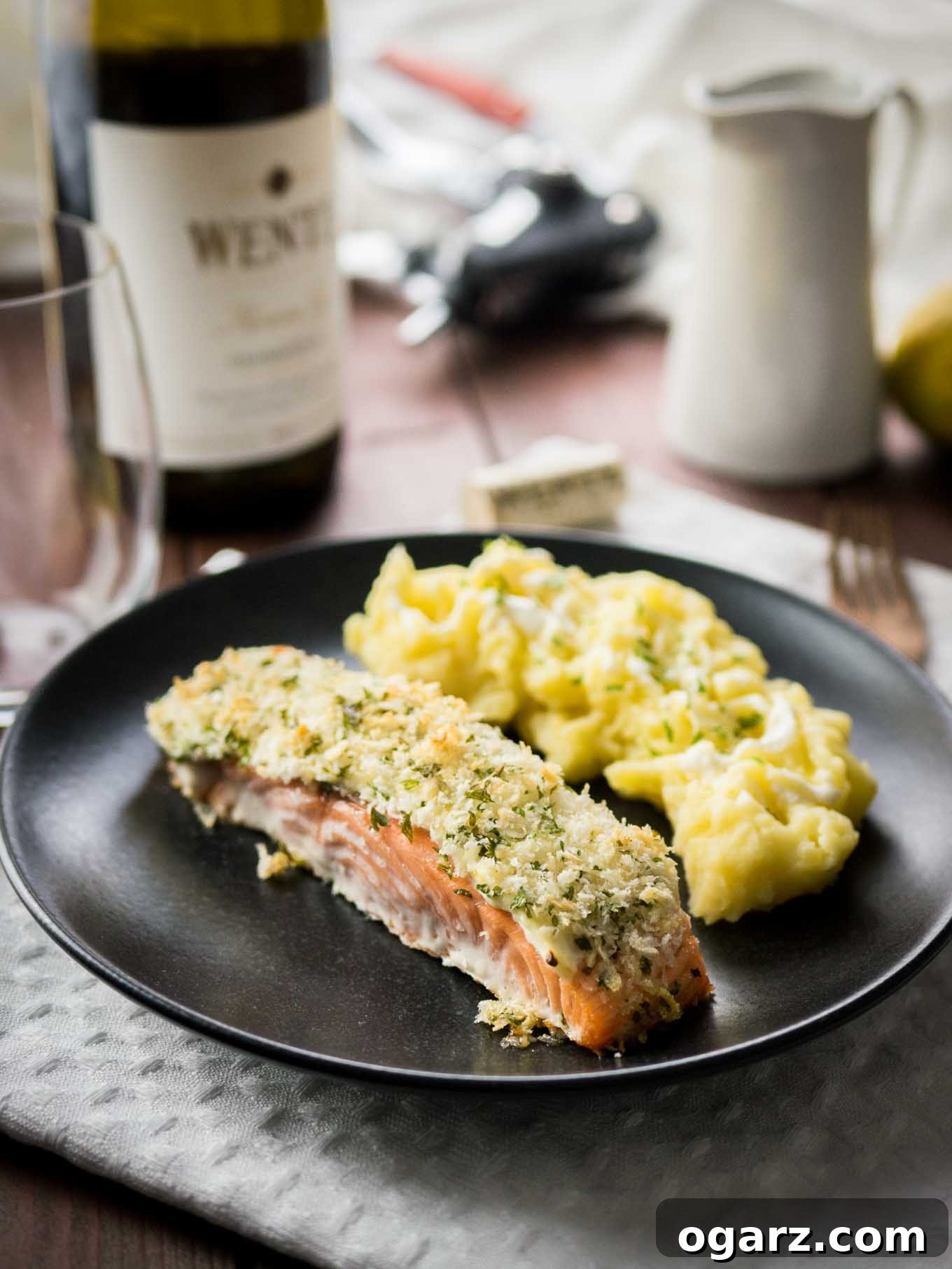 This Horseradish Parmesan crusted Salmon is baked in the oven and only takes 20 minutes to make. A dinner fancy enough for guests but also easy enough for weeknights!