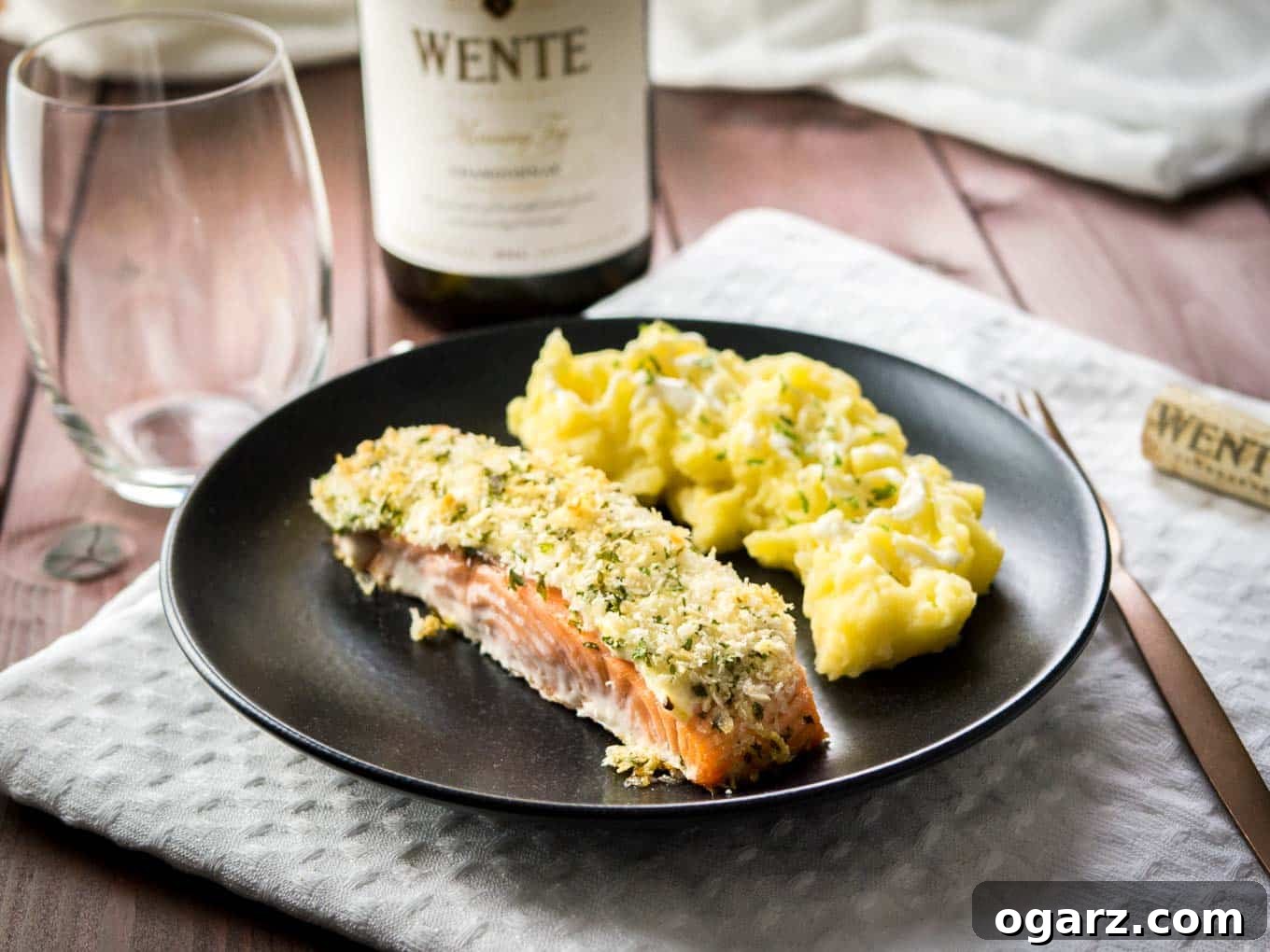 This Horseradish Parmesan crusted Salmon is baked in the oven and only takes 20 minutes to make. A dinner fancy enough for guests but also easy enough for weeknights!