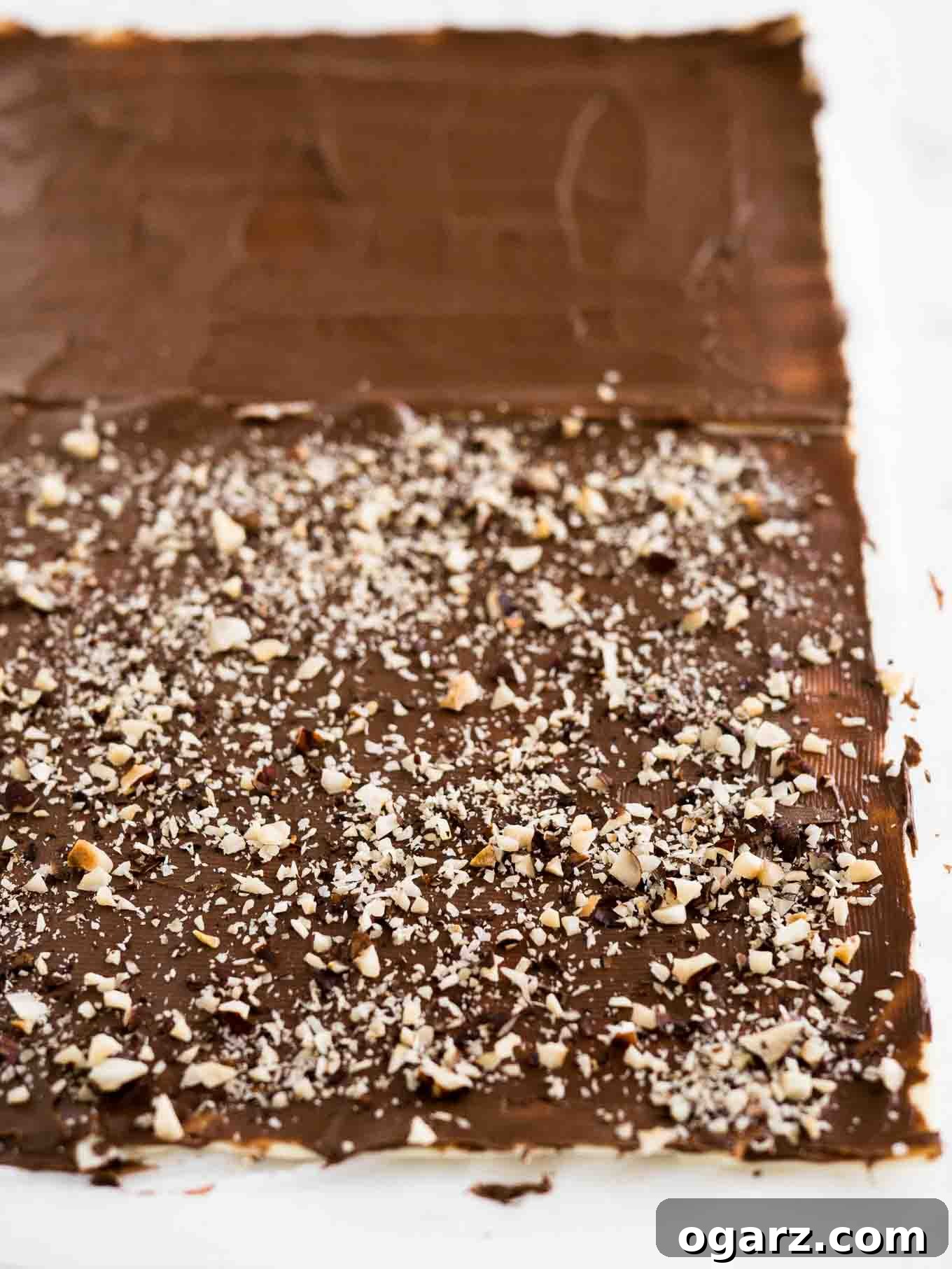 Simple Swirl Nutella Danish 3 Close-up of the twisted Nutella Danish pastry process, showing the layered puff pastry before being cut.