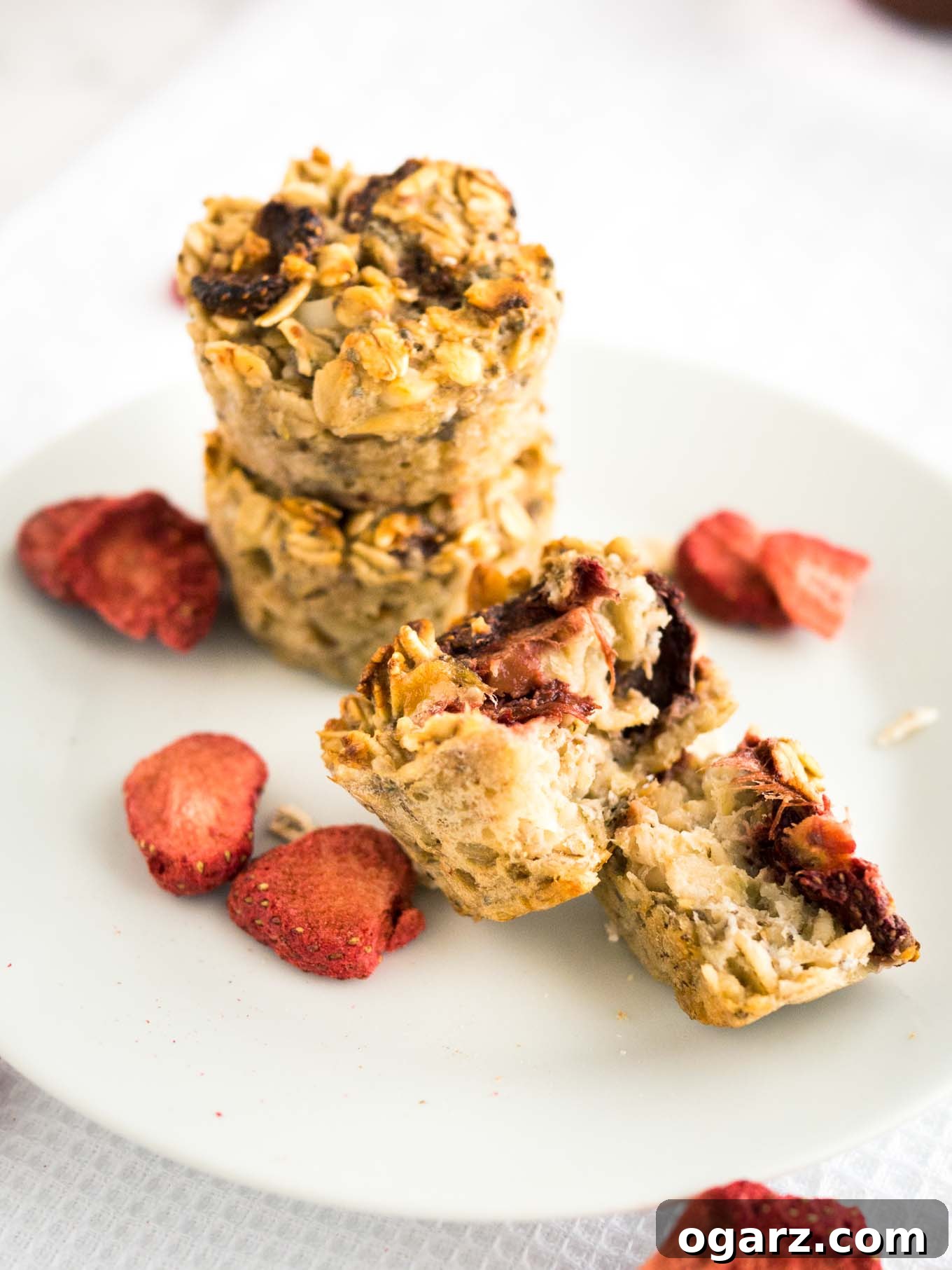 Healthy Strawberry Baked Oatmeal Cups 5 A basket full of freshly baked Strawberry Baked Oatmeal Cups, highlighting their appeal as a healthy, convenient breakfast or snack.