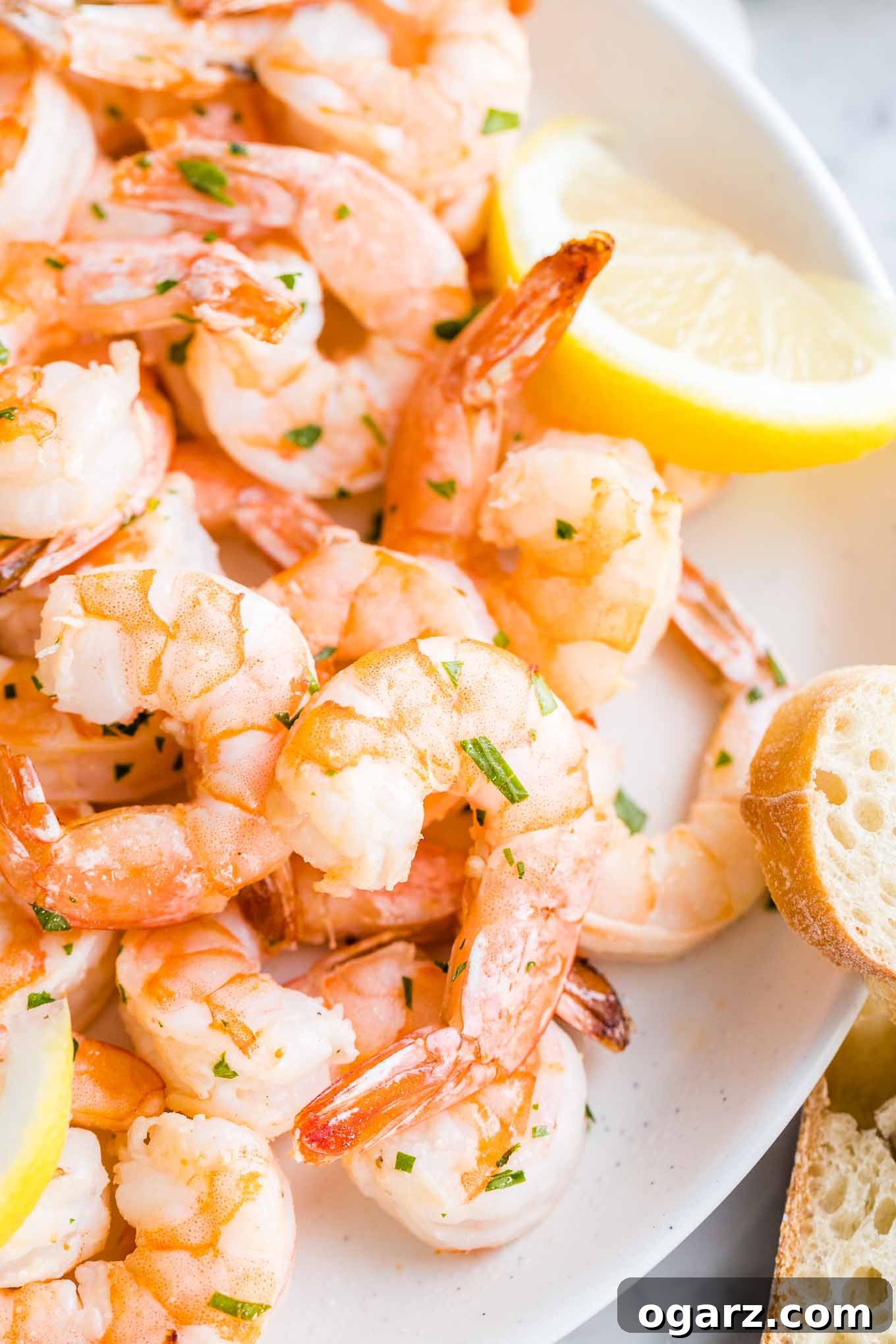 Close up shot of perfectly cooked air-fried shrimp, showcasing their pink color and plump texture