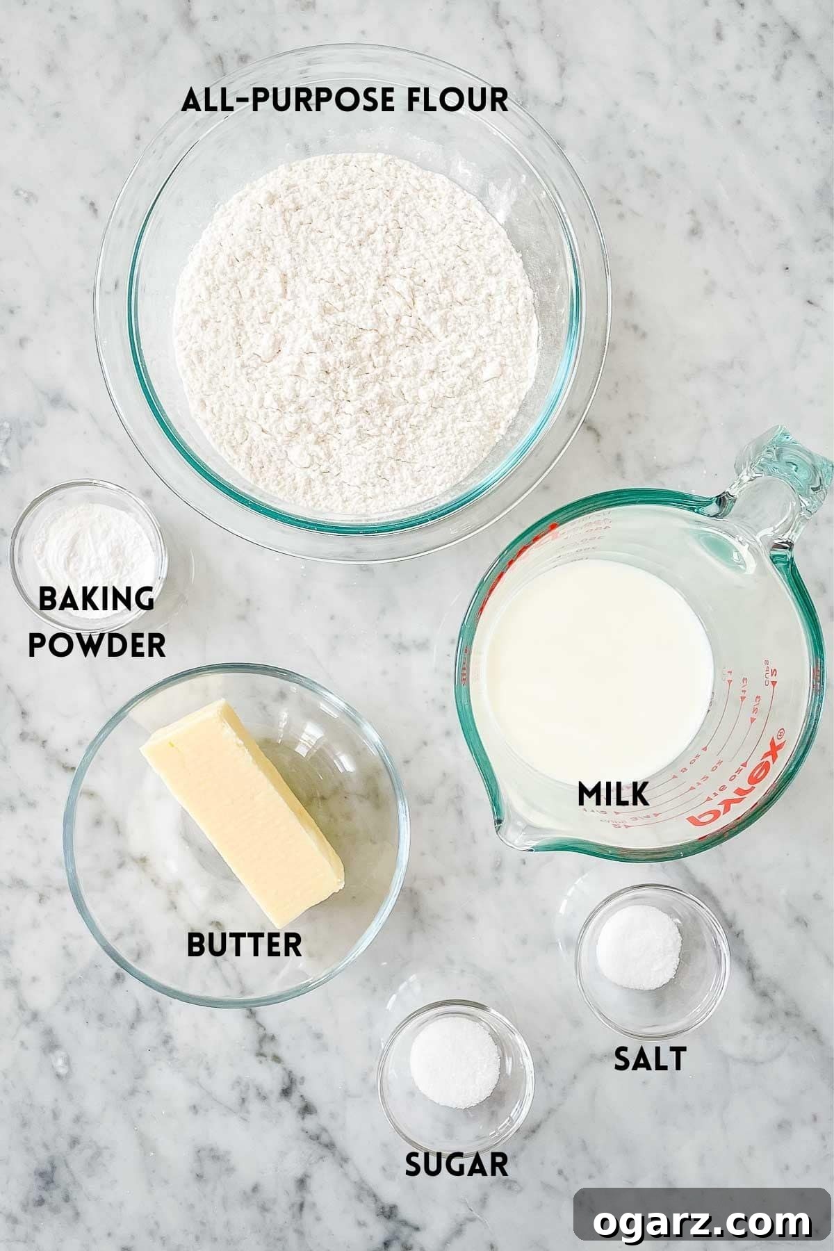 Golden Air Fryer Biscuits 3 Fresh ingredients laid out for making air fryer biscuits, including flour, butter, milk, and baking essentials.