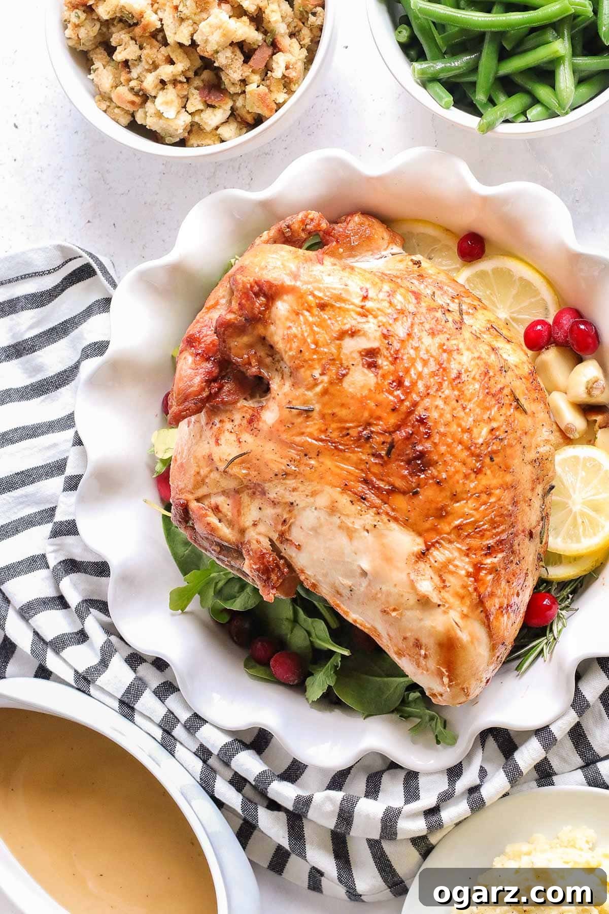 Crispy Air Fryer Turkey Breast 2 A beautifully roasted turkey breast on a elegant serving platter, ready to be carved