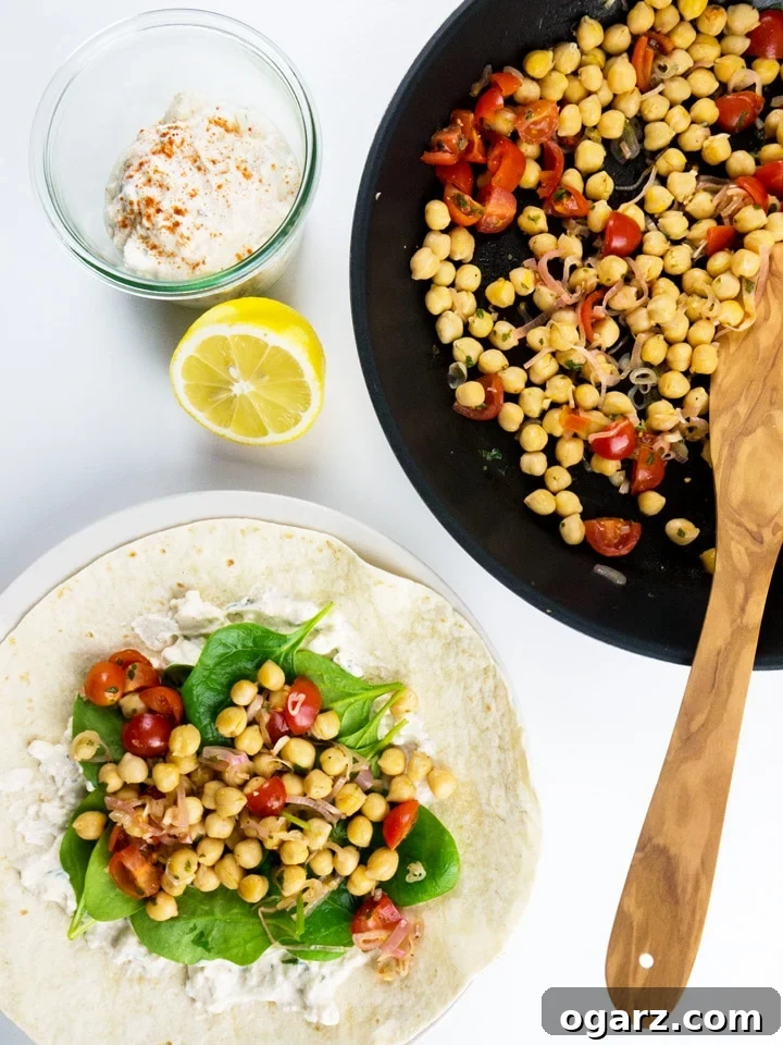 Vibrant Feta Spinach Chickpea Wrap 2 Spinach Wrap with Feta and Chickpeas makes the perfect midweek meal. The wraps are filled with feta spread, healthy chickpeas, and spinach. A great vegetarian dish which is ready in 15 minutes!