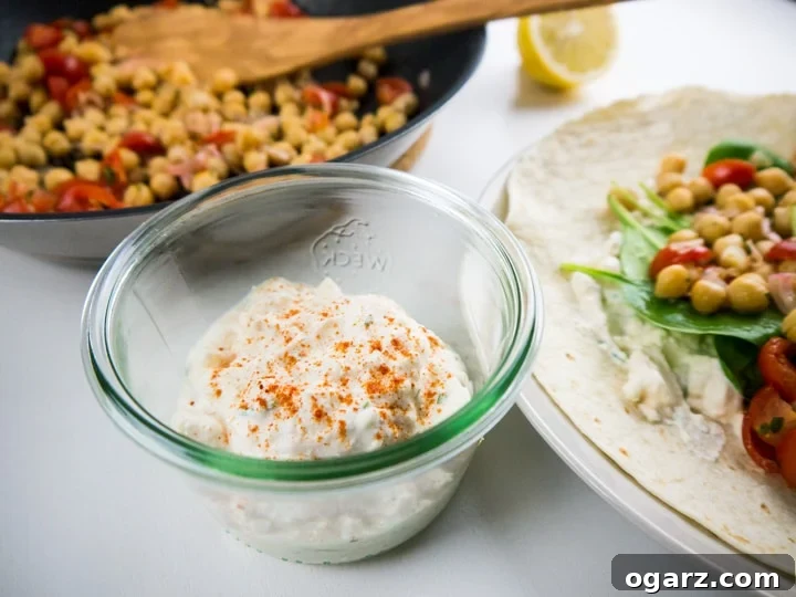 Vibrant Feta Spinach Chickpea Wrap 5 Spinach Wrap with Feta and Chickpeas makes the perfect midweek meal. The wraps are filled with feta spread, healthy chickpeas, and spinach. A great vegetarian dish which is ready in 15 minutes!