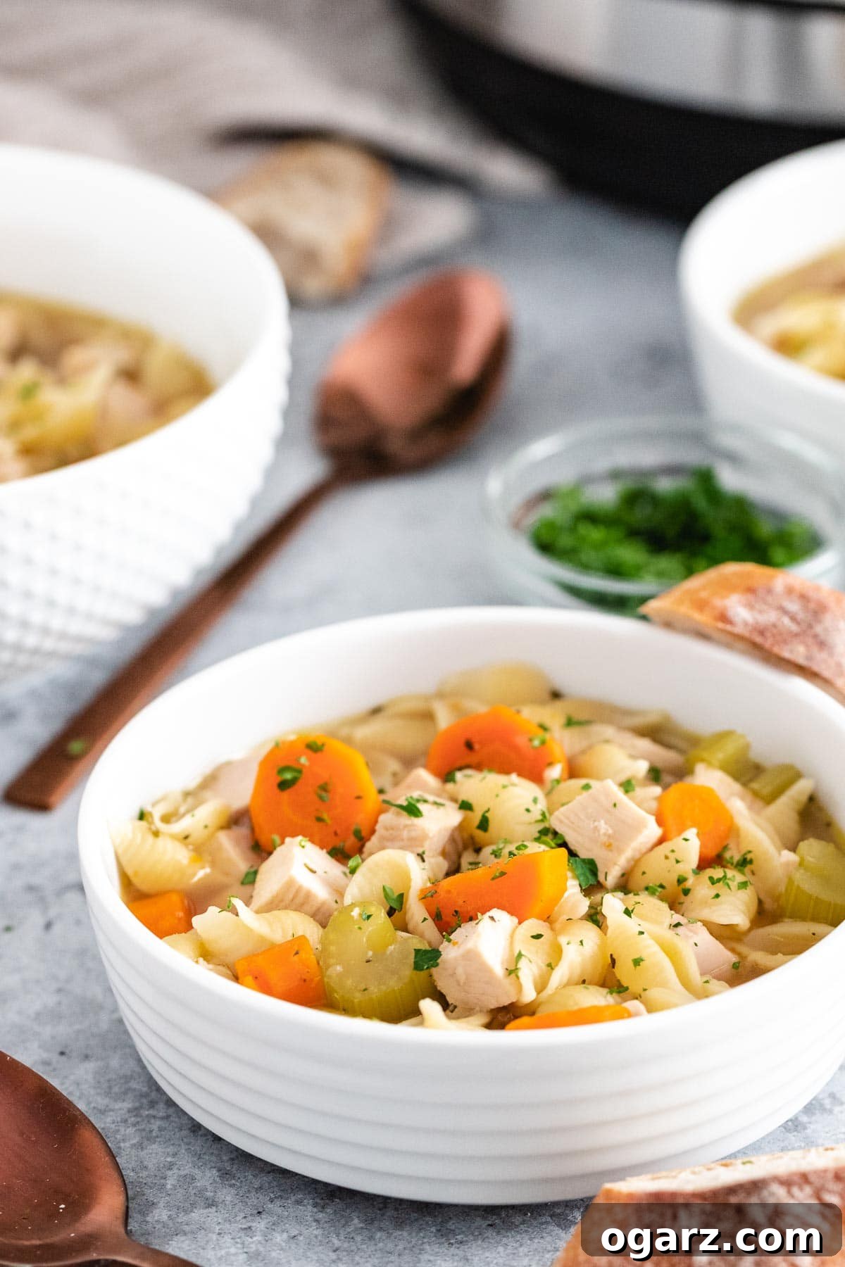 bowls filled with soup in front of an Instant Pot