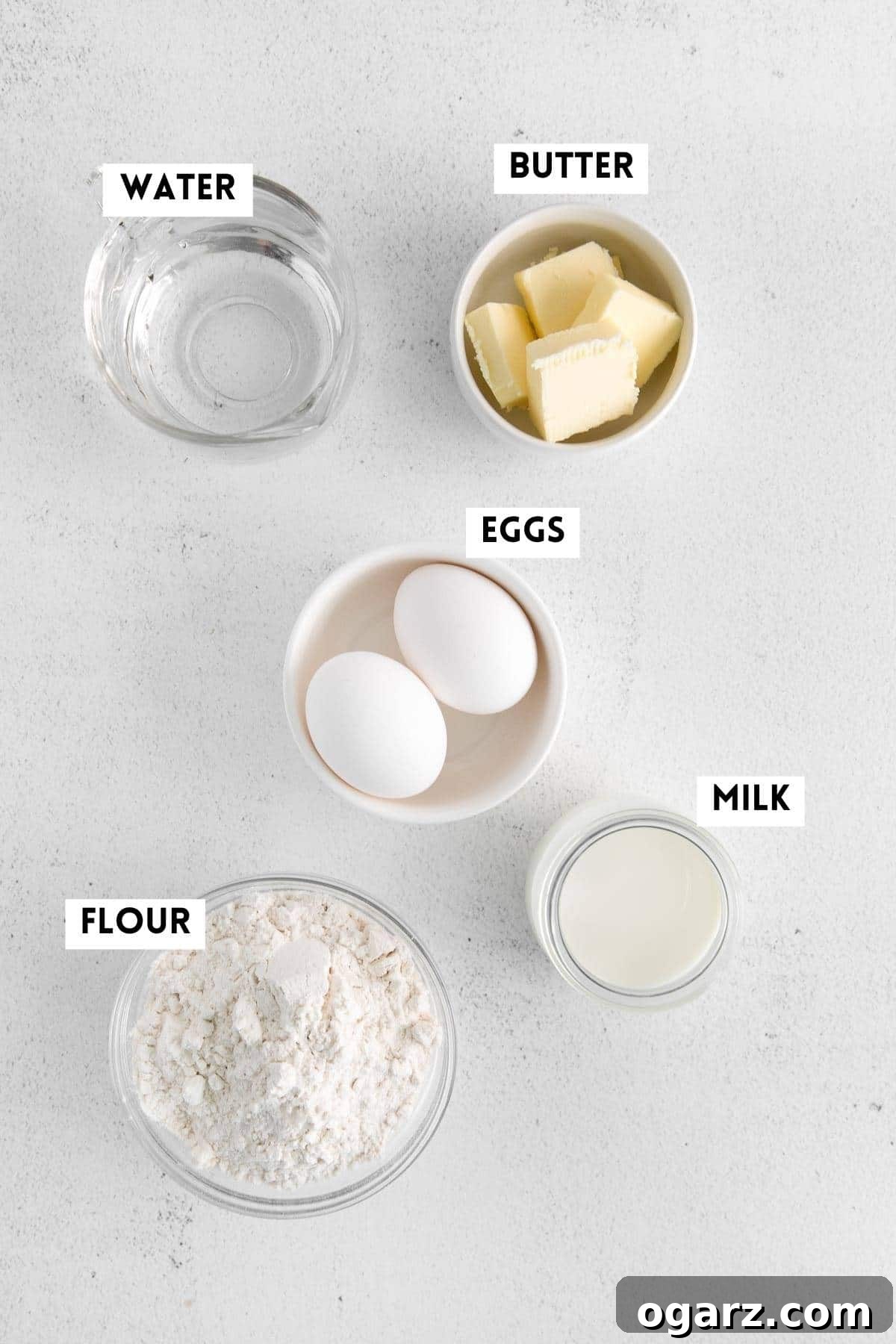 Effortless French Crepes 3 Ingredients for making French Crepes laid out on a table