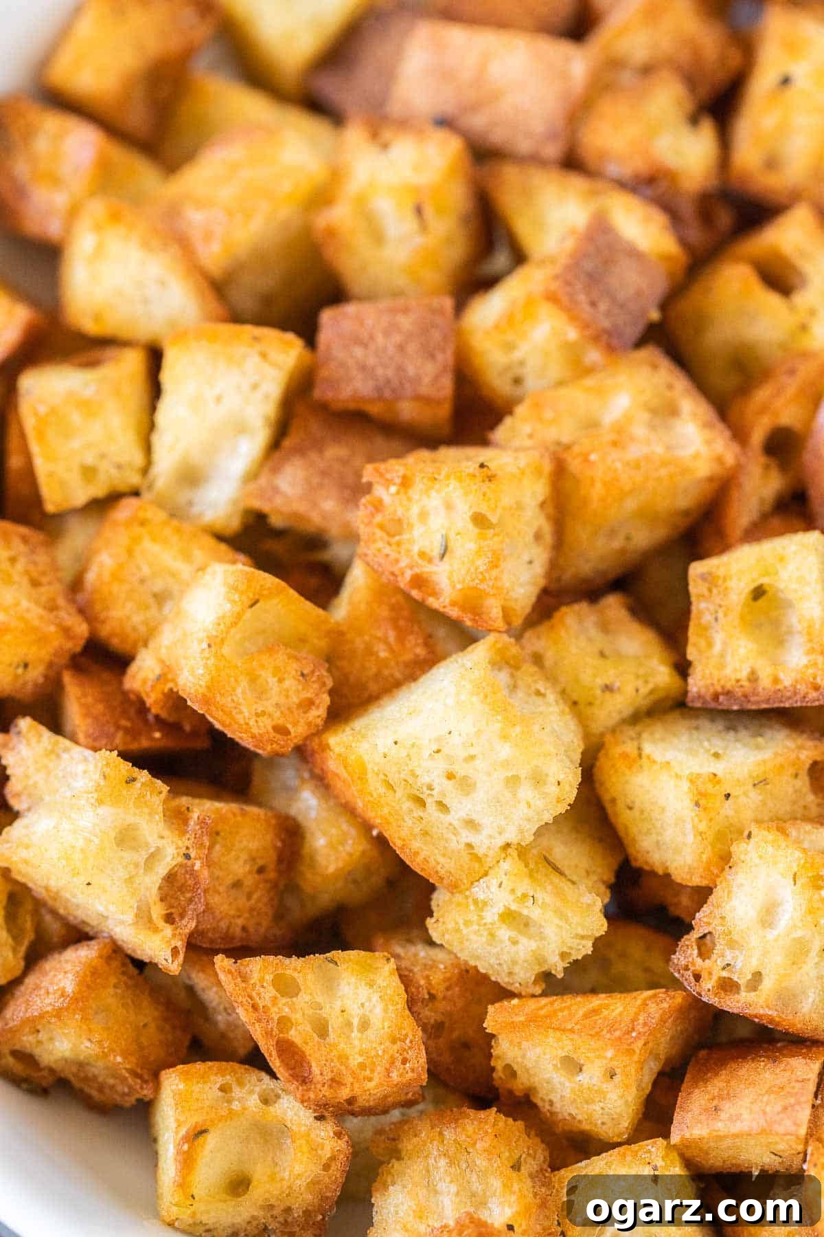 Crispy Air Fryer Croutons 5 A close-up shot of perfectly crispy, golden-brown croutons, highlighting their texture.