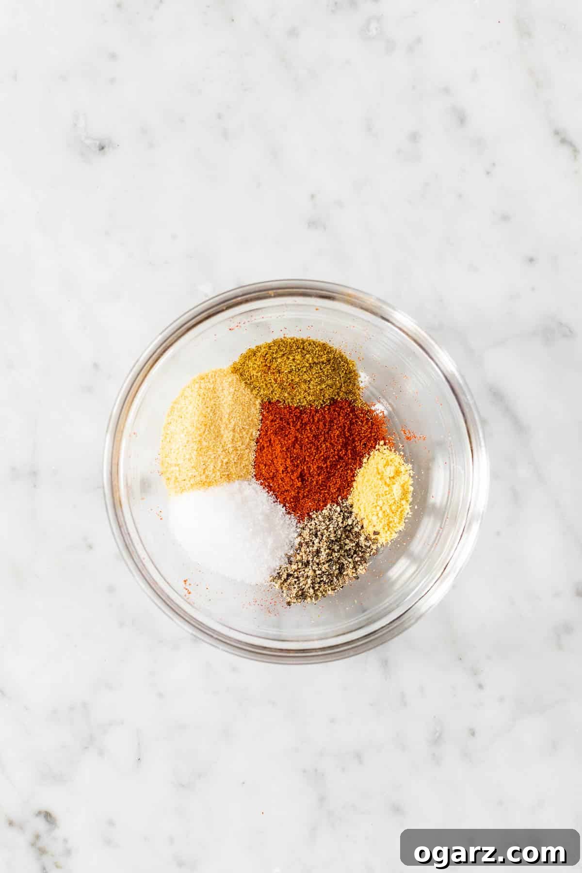Ultimate Barbecue Blend 4 Different spices and seasonings in a small glass bowl.