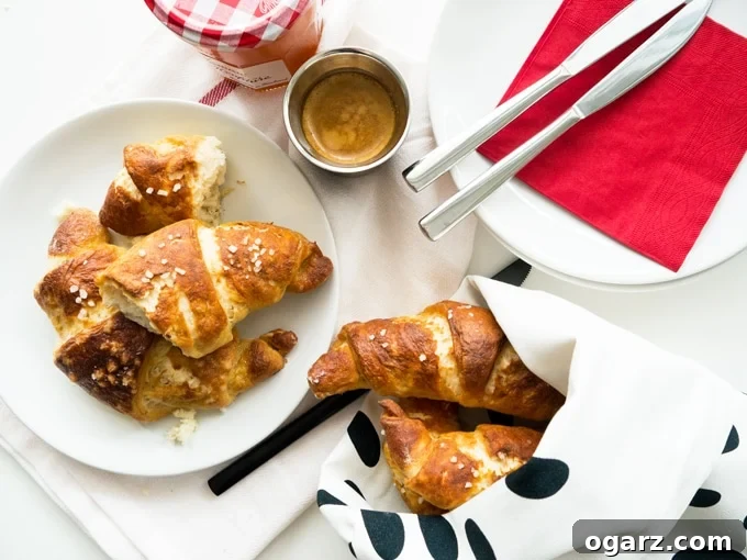 Effortless Pretzel Croissant Bliss 3 Easy homemade Pretzel Croissants with yeast dough and store-bought puff pastry. They combine the flakiness of a butter croissant with the texture of a pretzel.