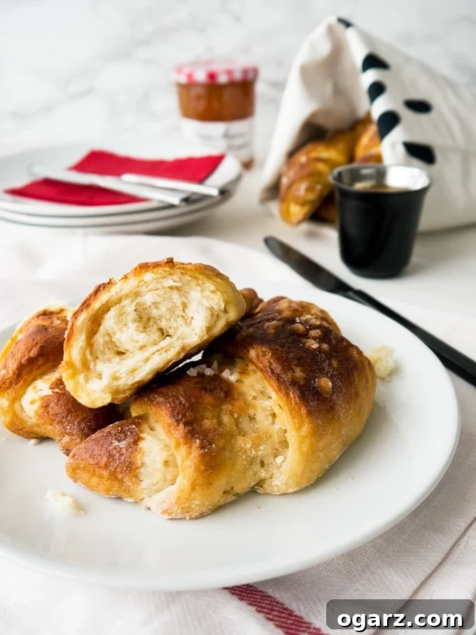 Effortless Pretzel Croissant Bliss 4 Easy homemade Pretzel Croissants with yeast dough and store-bought puff pastry. They combine the flakiness of a butter croissant with the texture of a pretzel.