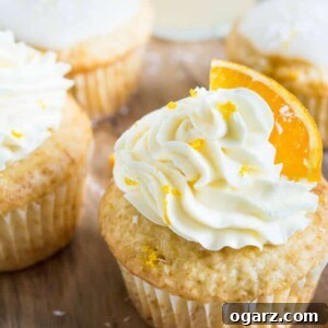 Tropical Coconut Orange Creamsicle Cupcakes with two topping options: buttercream and glaze.