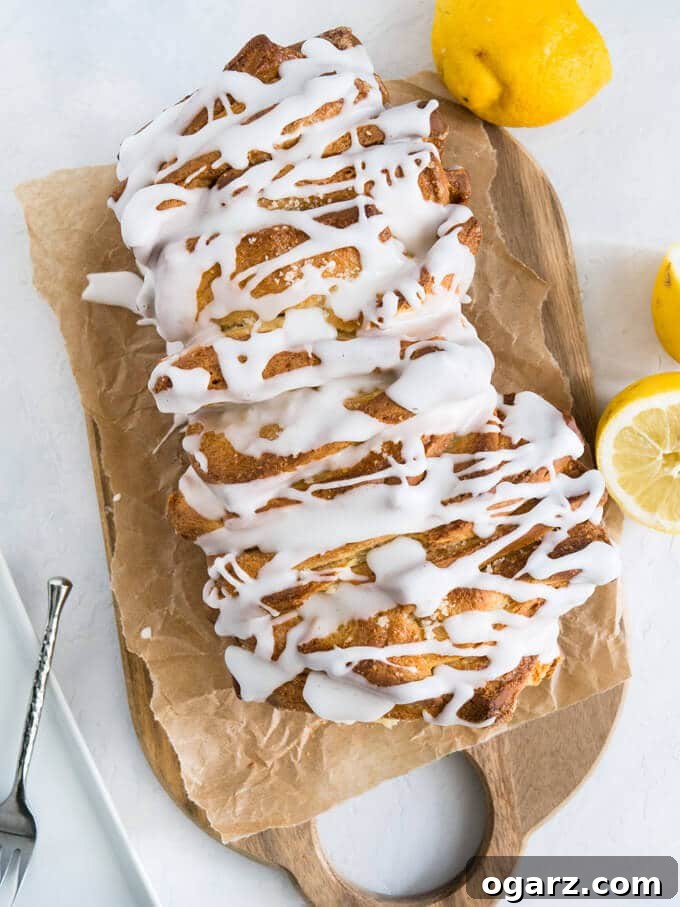 Sunshine Lemon Pull Apart Treat 3 Lemon Pull Apart Coffee Cake - A beautiful light and fluffy sweet bread, filled with lemon butter and topped with a tangy lemon glaze!