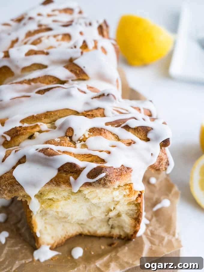 Sunshine Lemon Pull Apart Treat 5 Lemon Pull Apart Coffee Cake - A beautiful light and fluffy sweet bread, filled with lemon butter and topped with a tangy lemon glaze!