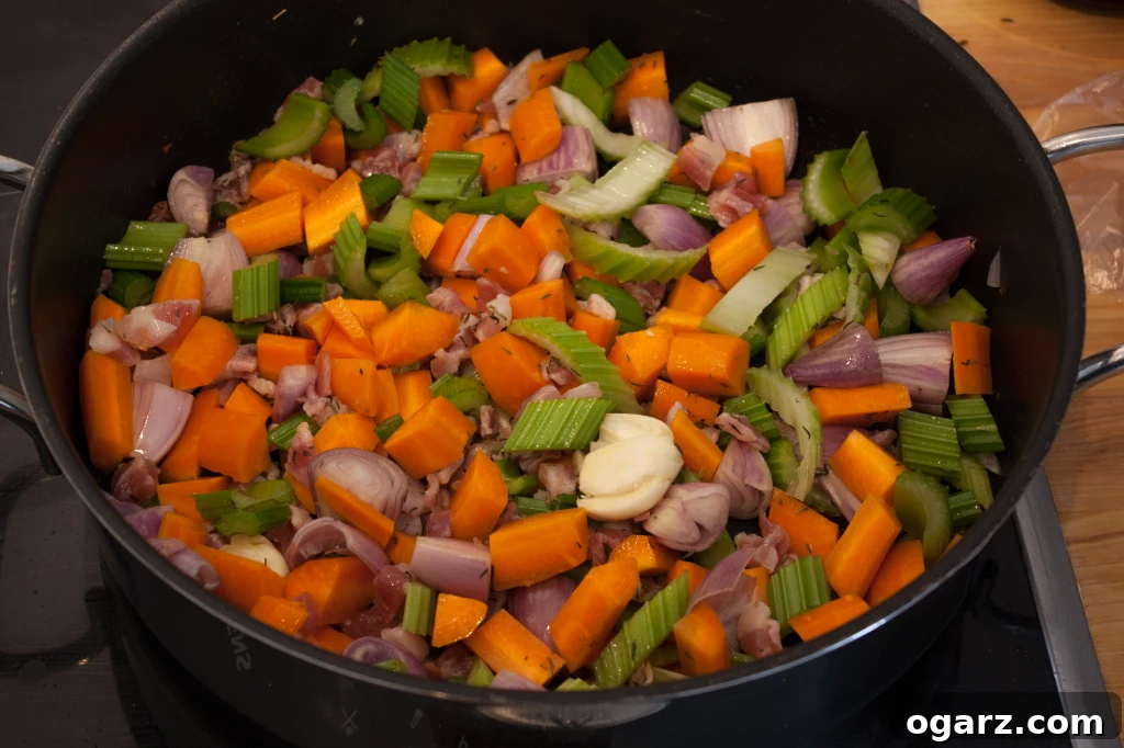 Effortless Coq au Vin Classic 4 Sautéing vegetables and bacon for Coq au Vin