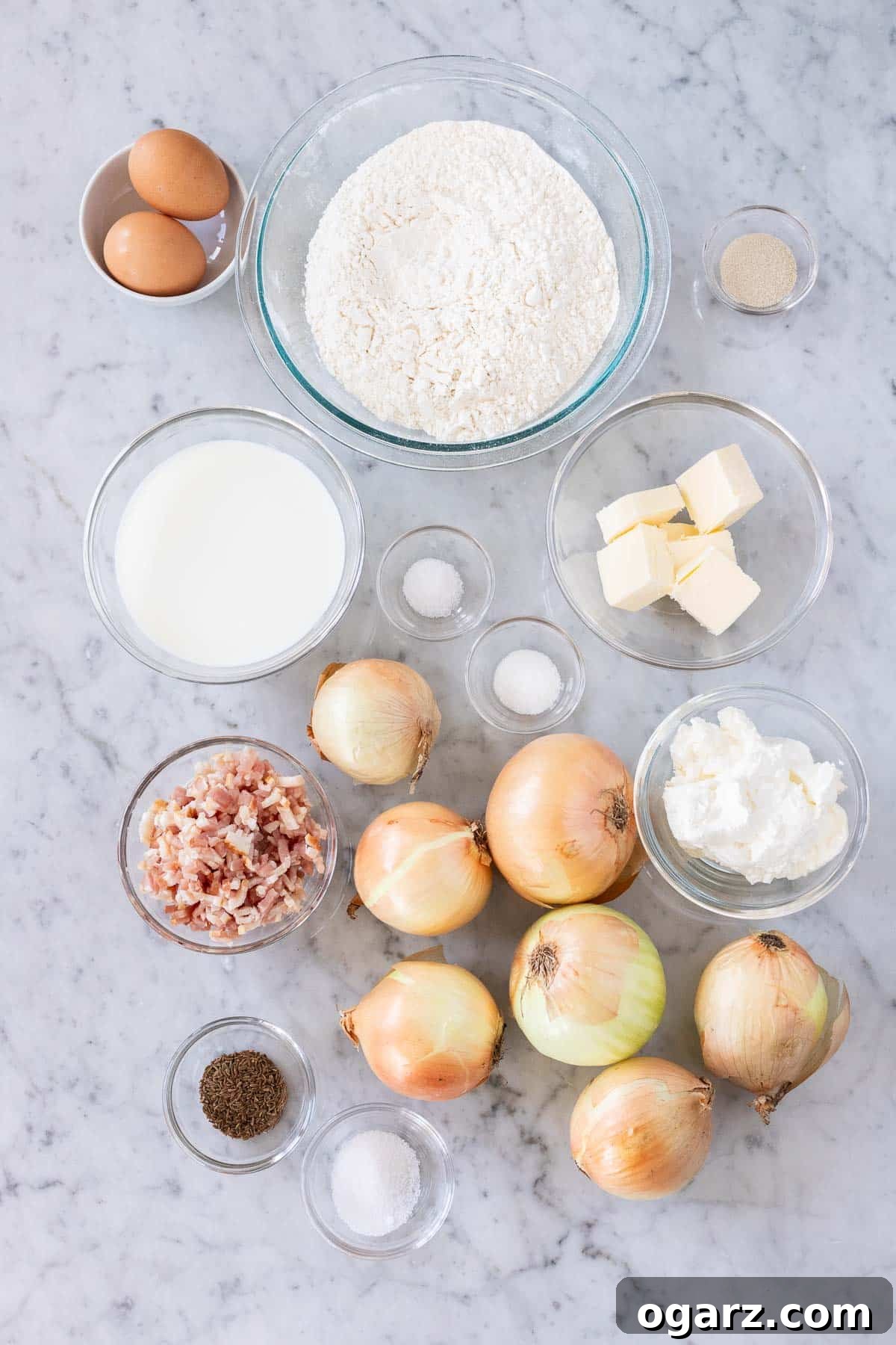 Ingredients for German Onion pie laid out on a kitchen counter.