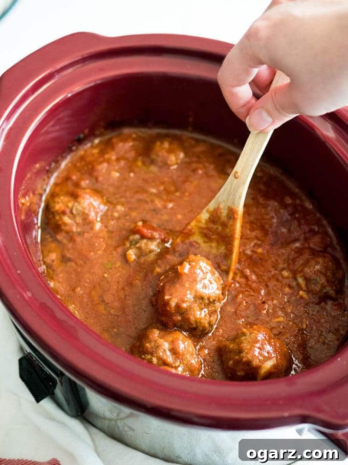 Effortless Slow Cooker Italian Meatballs 3 Easy Crockpot Italian Meatballs smothered in a homemade marinara sauce made with Italian herbs and balsamic vinegar. This recipe comes together in minutes and will have everybody begging for seconds!