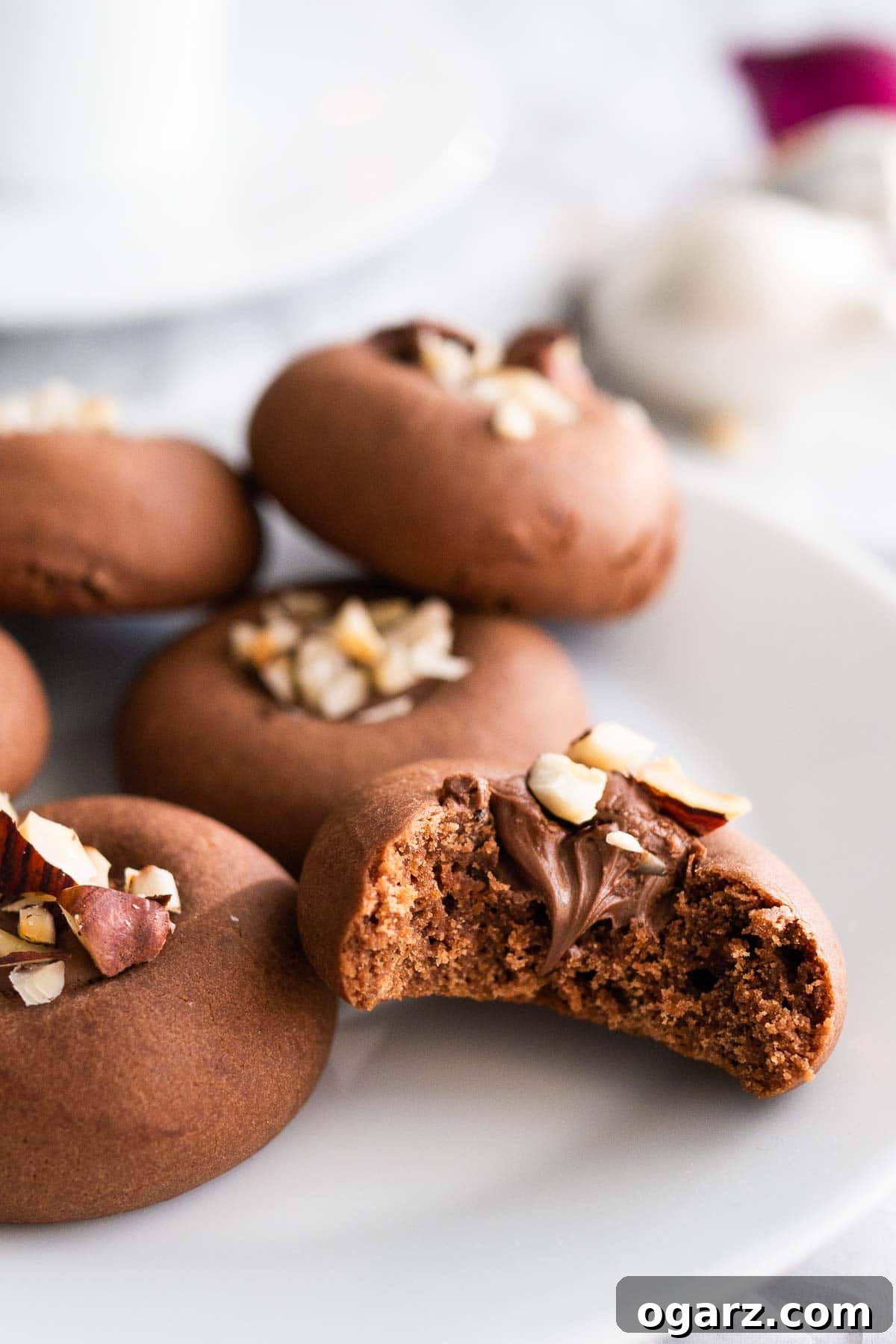 Irresistible Nutella Cookies 2 Delicious Nutella Stuffed Cookies on a White Plate