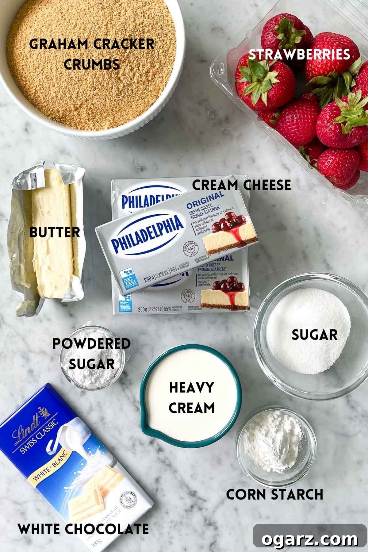 Effortless Strawberry Cheesecake Bliss 3 All the fresh ingredients laid out for a No-Bake Strawberry Cheesecake, including strawberries, cream cheese, and butter.