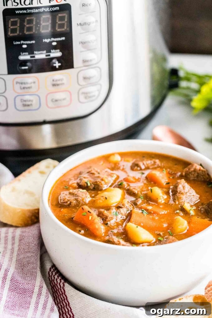 Effortless Instant Pot Beef Stew 4 A bowl of beef stew next to an Instant Pot