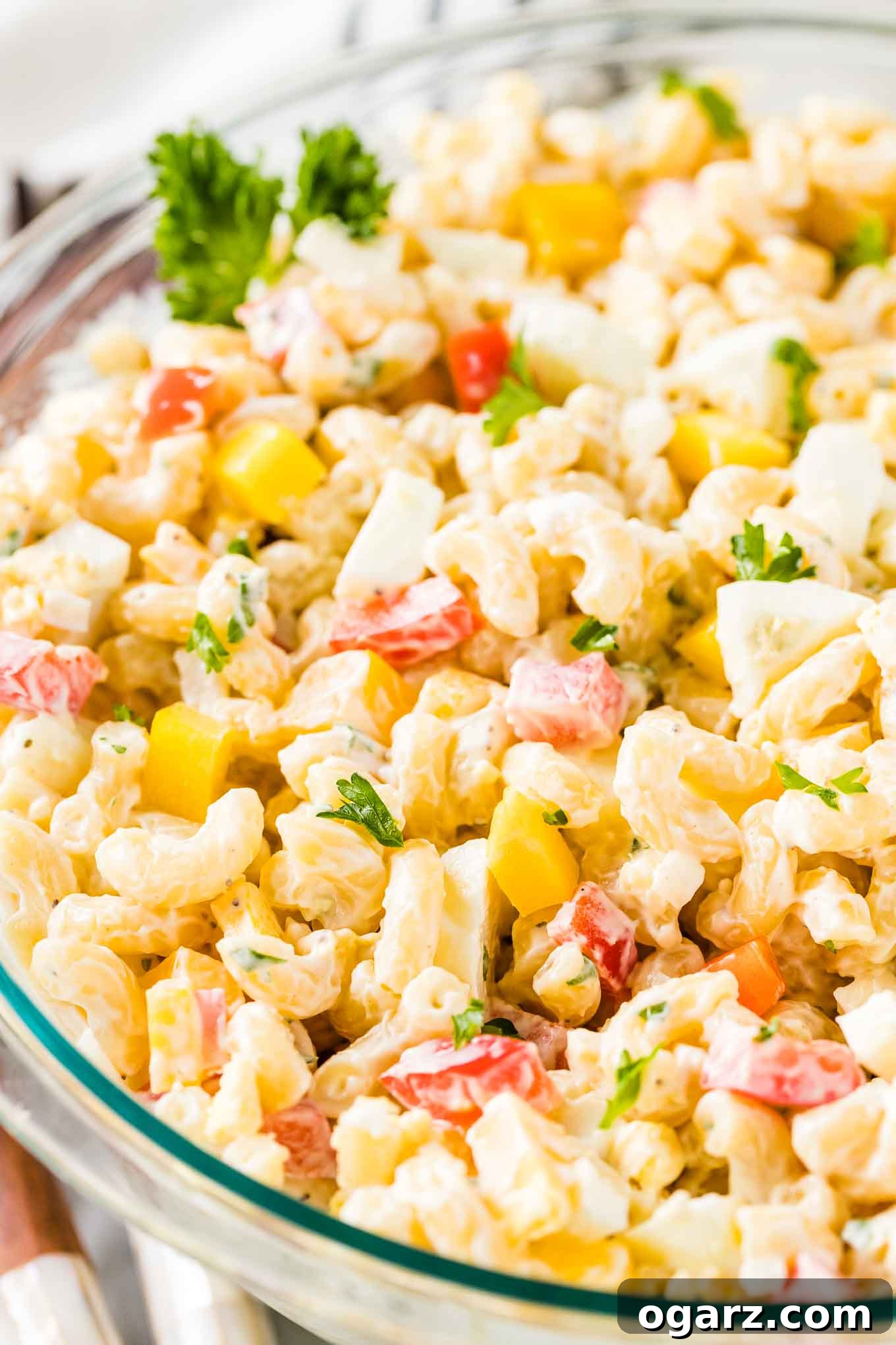 Macaroni Salad in a glass bowl.