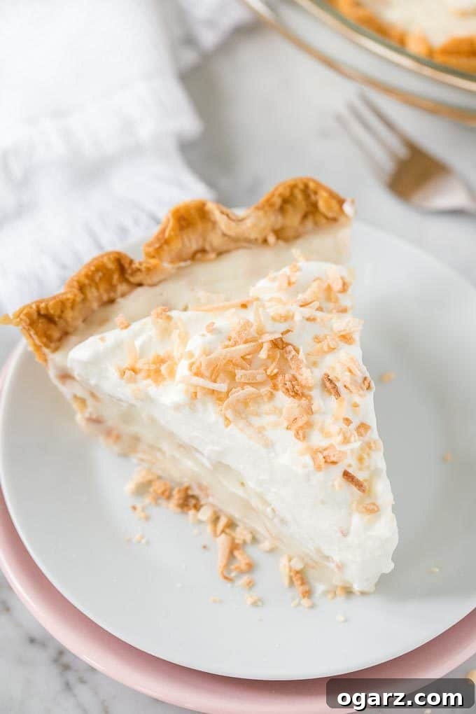 Heavenly Coconut Bliss 7 A slice of Coconut Cream Pie on a plate