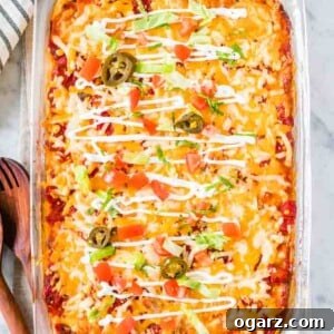 Fiesta Lasagna 6 Taco Lasagna in a glass baking dish topped with sour cream