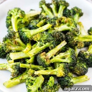 Crispy Air-Fried Broccoli 5 Roasted broccoli on a white plate