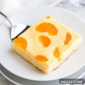 A cheesecake bar on a white plate