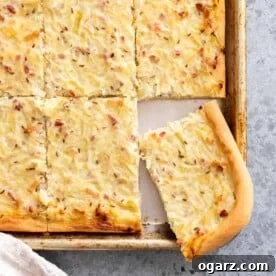 German Onion Pie on a baking sheet.